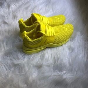 Yellow Nike prestos